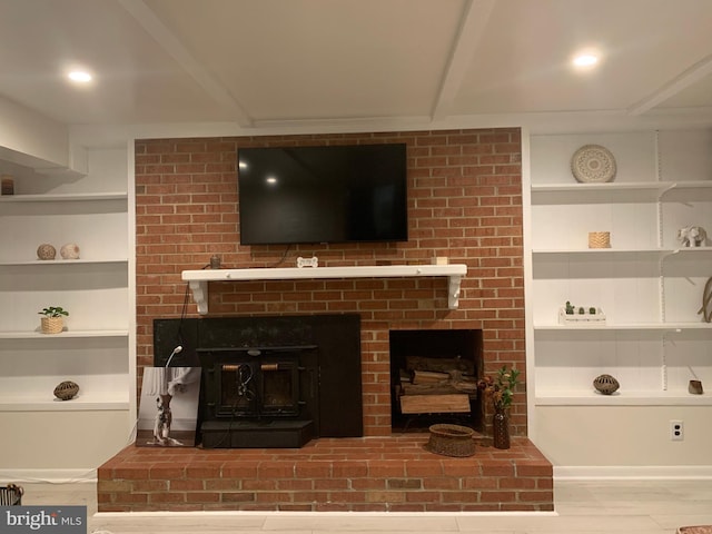 8107 Orville St, Alexandria, VA 22309 - living area with wood finished floors, a fireplace, and built in features