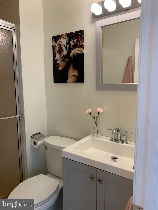8107 Orville St, Alexandria, VA 22309 - full bathroom featuring toilet, vanity, and a stall shower
