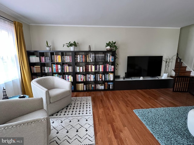 8107 Orville St, Alexandria, VA 22309 - living area featuring stairway, ornamental molding, and wood finished floors