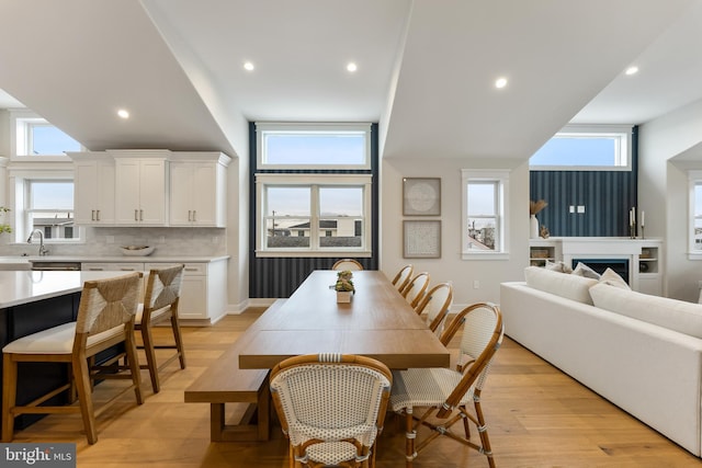 dining area with light wood-type flooring