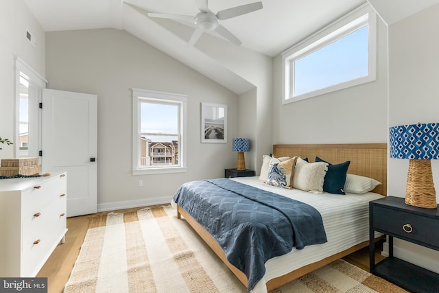 bedroom with ceiling fan and light hardwood / wood-style floors