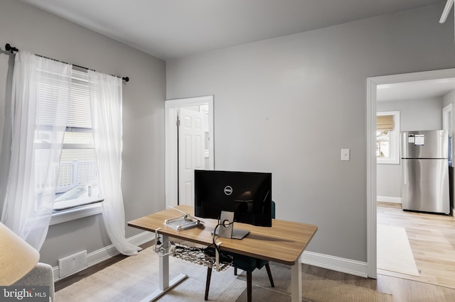 office featuring light hardwood / wood-style flooring