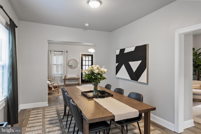 dining area featuring hardwood / wood-style flooring