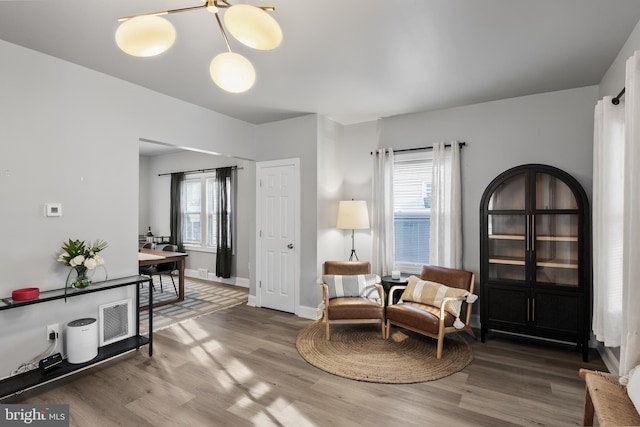 living area with wood-type flooring