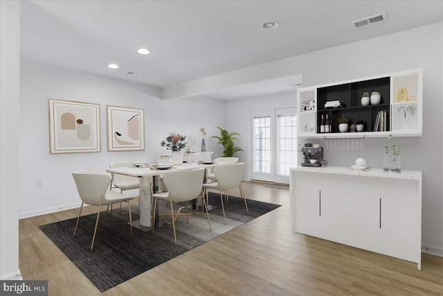 dining area featuring hardwood / wood-style flooring