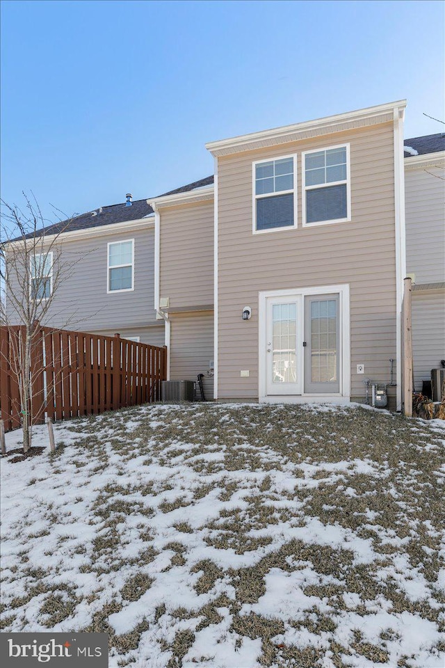 view of snow covered house