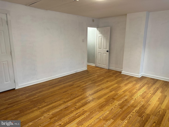 empty room featuring hardwood / wood-style floors