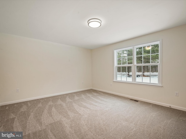 view of carpeted spare room