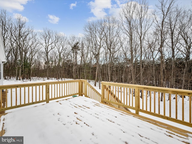 view of snow covered deck