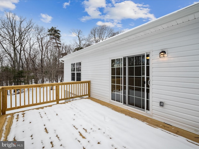 view of snow covered deck