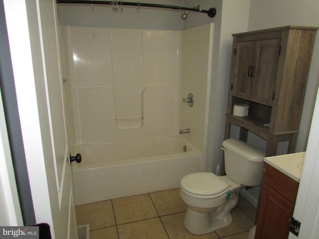 full bathroom featuring toilet, tile patterned flooring, vanity, and shower / tub combination