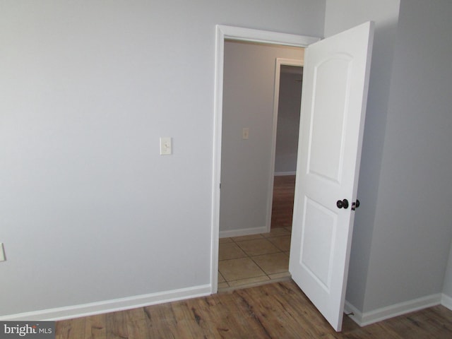 empty room featuring dark wood-type flooring