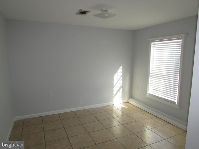 view of tiled spare room