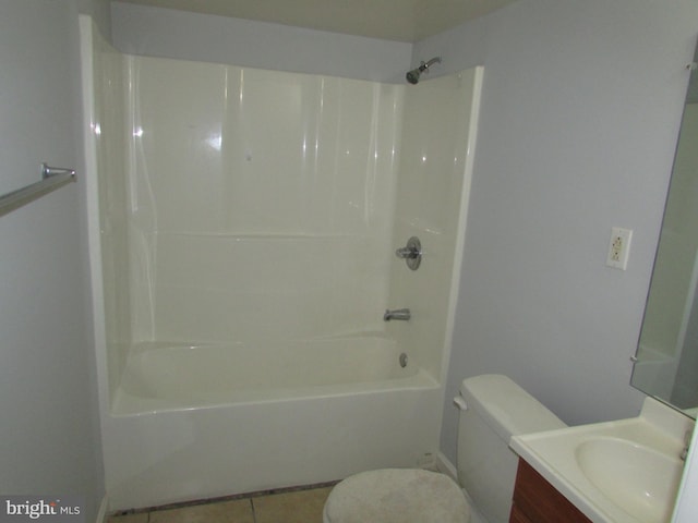 full bathroom with shower / bath combination, vanity, tile patterned floors, and toilet