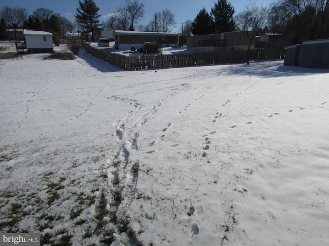 view of yard covered in snow