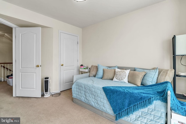 bedroom featuring carpet flooring