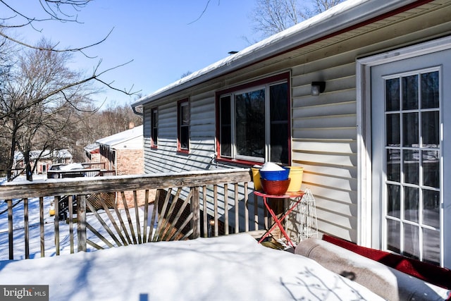 view of snow covered deck