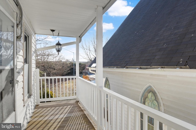 balcony featuring a porch