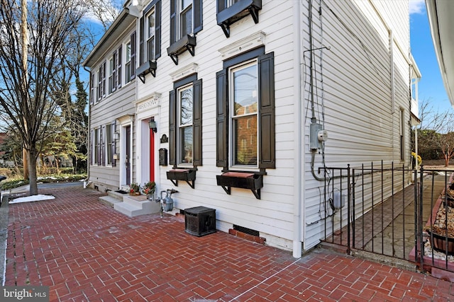 view of property exterior featuring a patio area