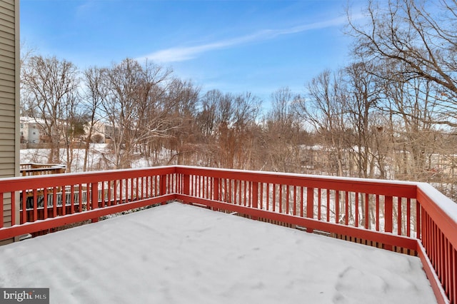 view of snow covered deck