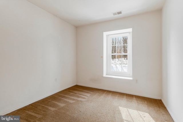 view of carpeted spare room