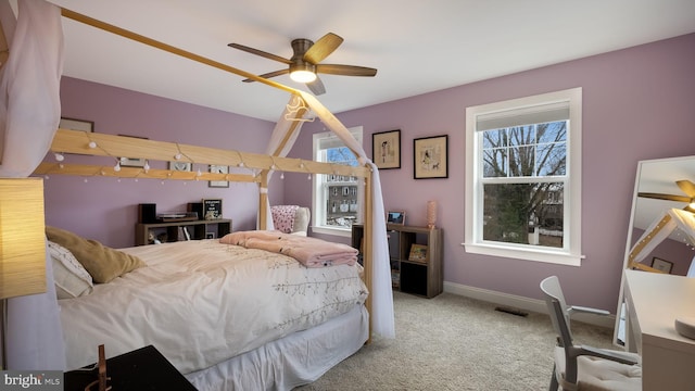 bedroom featuring ceiling fan and carpet floors