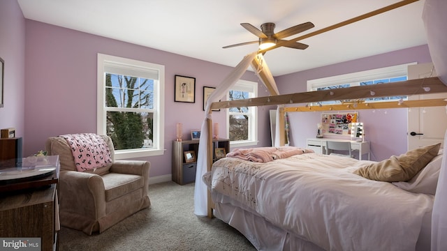 carpeted bedroom with ceiling fan