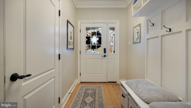 mudroom featuring light hardwood / wood-style floors and ornamental molding