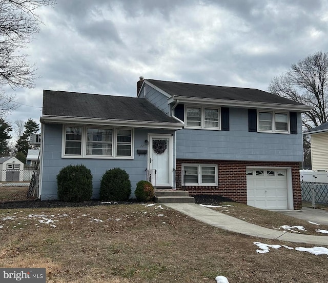 split level home with a garage