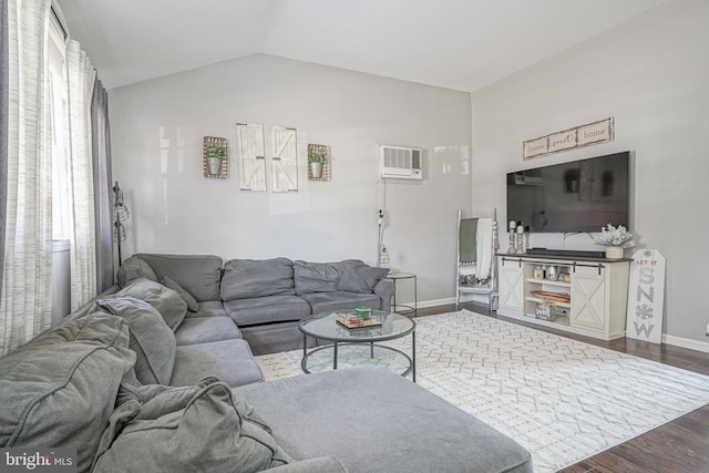 living room featuring dark hardwood / wood-style flooring and vaulted ceiling