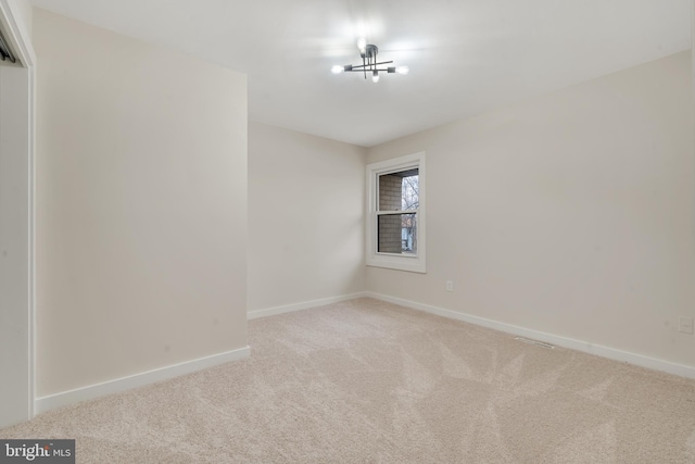 unfurnished room with carpet