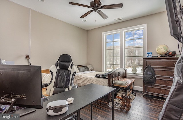 bedroom featuring dark hardwood / wood-style floors and ceiling fan