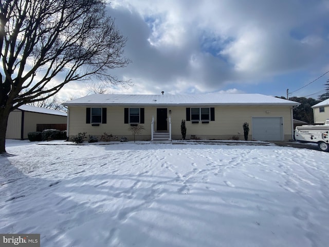 single story home featuring a garage