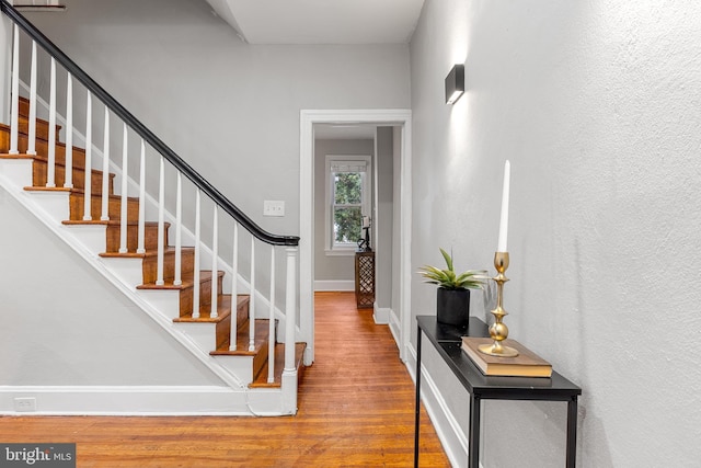 entrance foyer with hardwood / wood-style floors