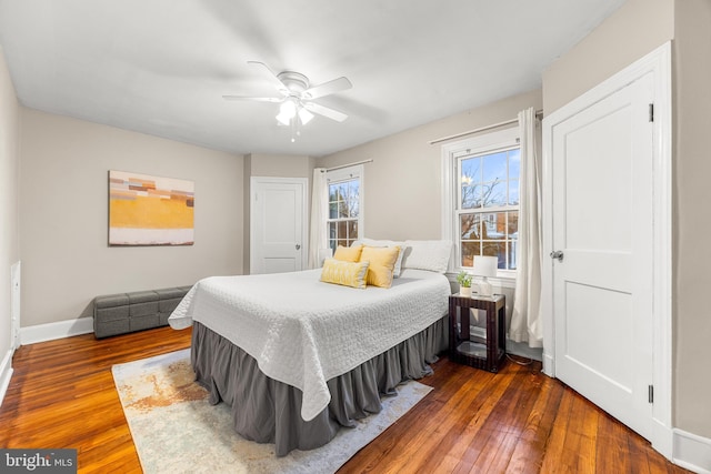 bedroom featuring ceiling fan and wood-type flooring