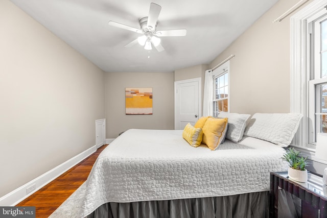 bedroom featuring ceiling fan and wood-type flooring