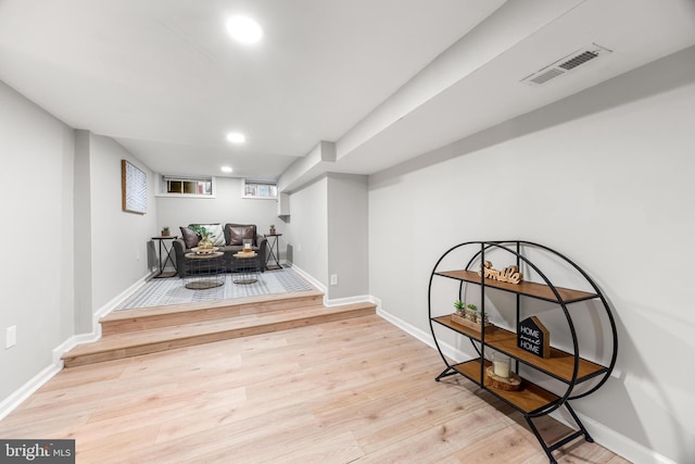 sitting room with light hardwood / wood-style floors