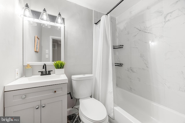 full bathroom featuring toilet, vanity, and shower / bath combo with shower curtain