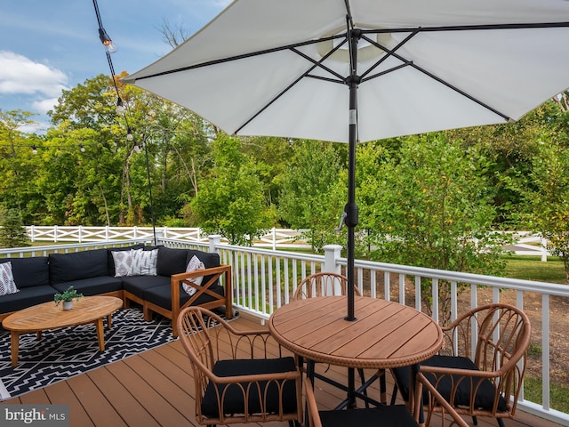 deck with an outdoor living space