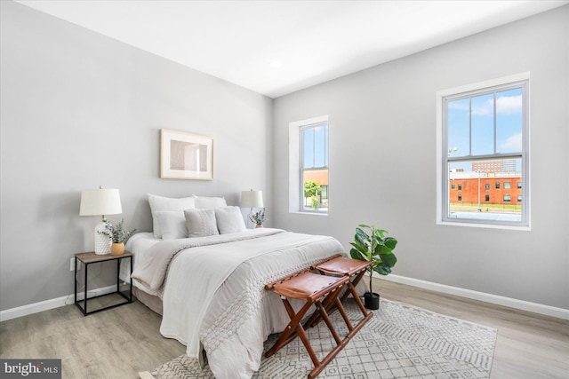 bedroom featuring light hardwood / wood-style floors