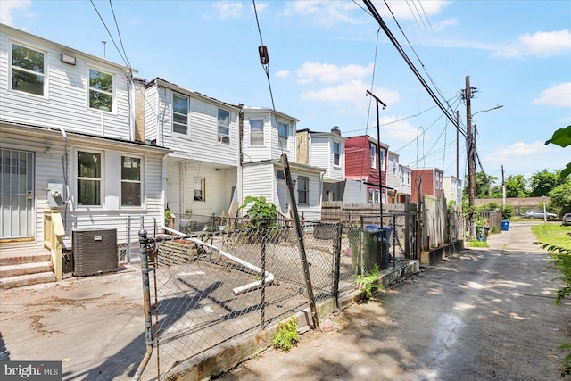 view of front of property featuring central air condition unit