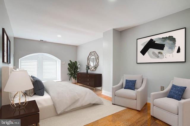 bedroom featuring hardwood / wood-style floors