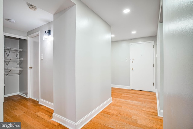 hallway featuring light hardwood / wood-style flooring