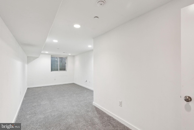 basement with carpet flooring