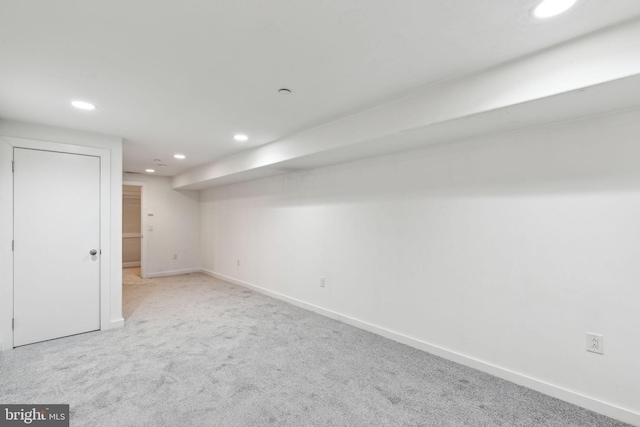 basement with light carpet