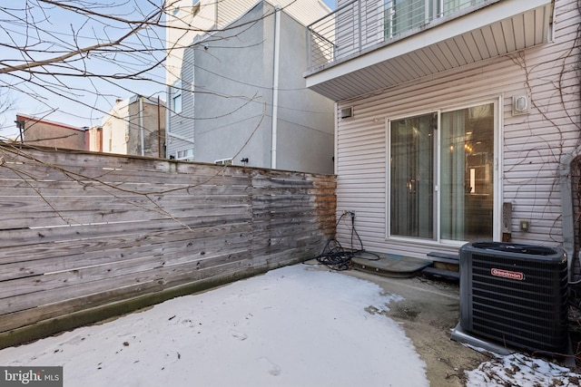 exterior space featuring central AC unit