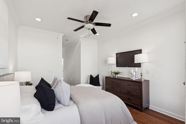 bedroom featuring ceiling fan, wood-type flooring, and crown molding