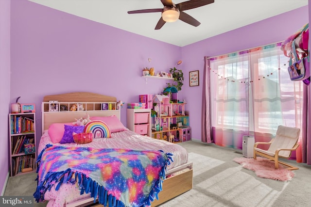 carpeted bedroom with ceiling fan