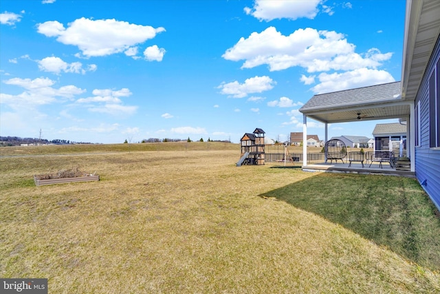 view of yard featuring a playground