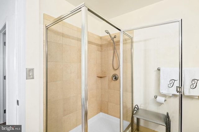 bathroom featuring walk in shower